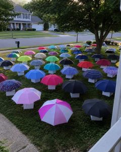 My Son Gave His Umbrella to a Pregnant Stranger in the Rain – The Next Morning, 47 Umbrellas Appeared on Our Lawn, Each With a Numbered Box That Made My Heart Stop